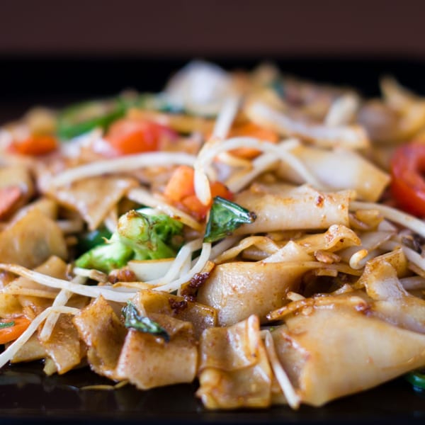 Close-up of Hibachi Boy's Japanese stir-fried noodles with vegetables and bean sprouts.